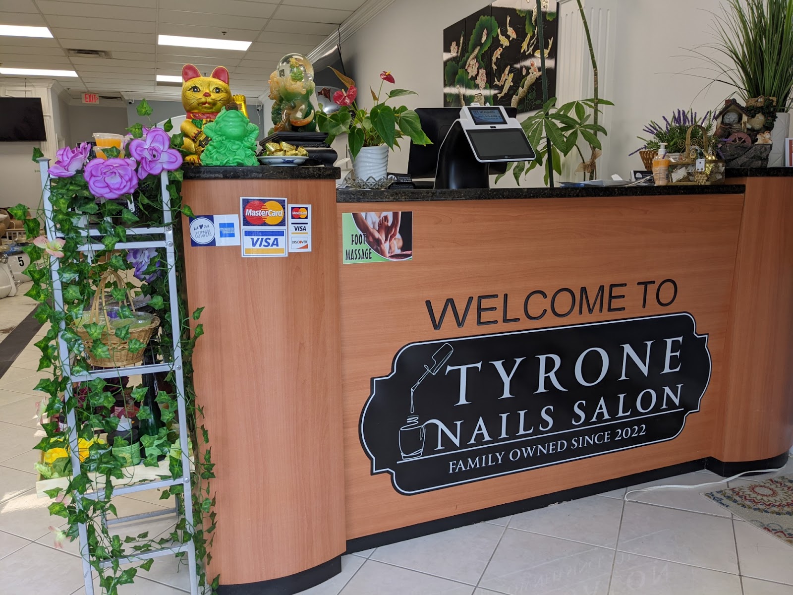 Tyrone Nails Salon logo